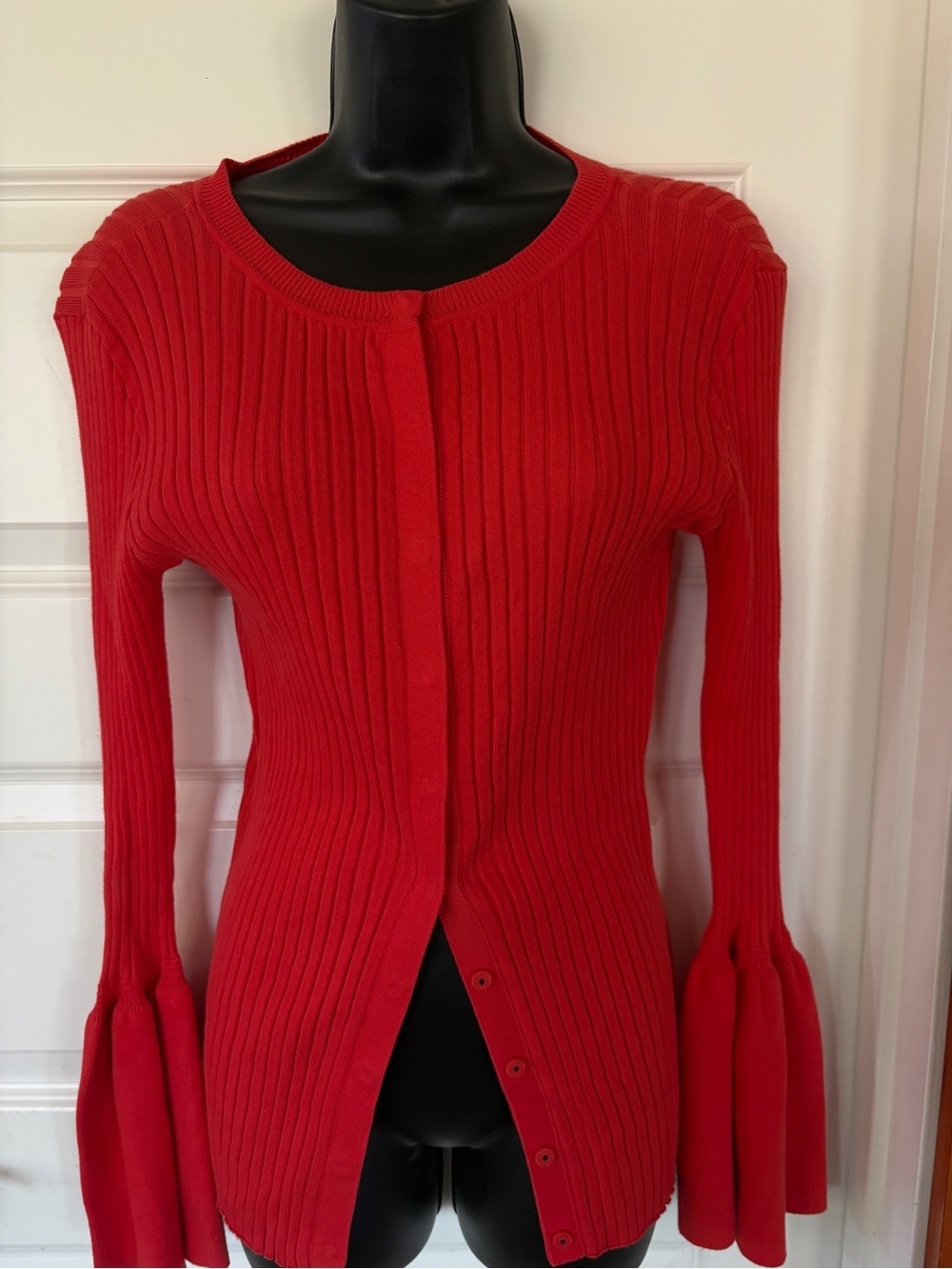 Cabi bright orange ribbed Sweater with snap buttons and Flared sleeves.